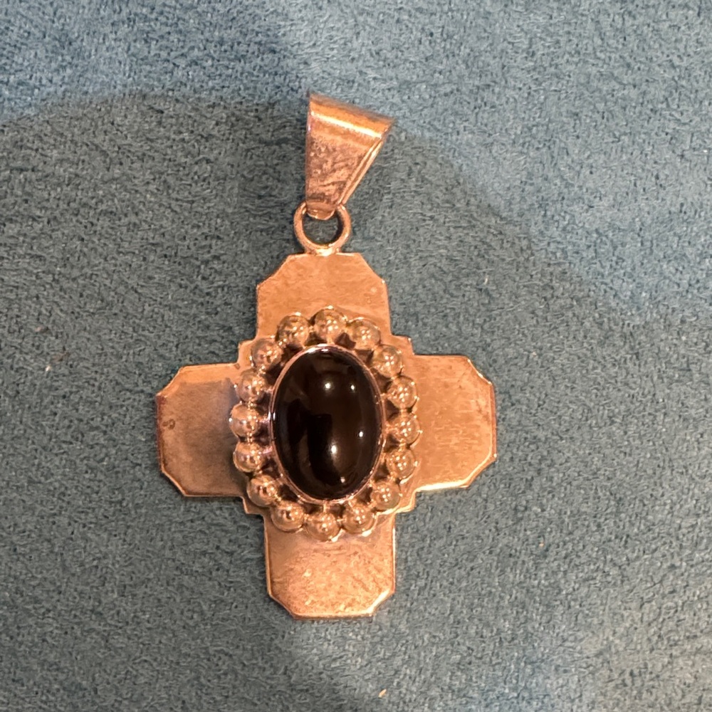 Elegant Sterling silver and onyx Cross.